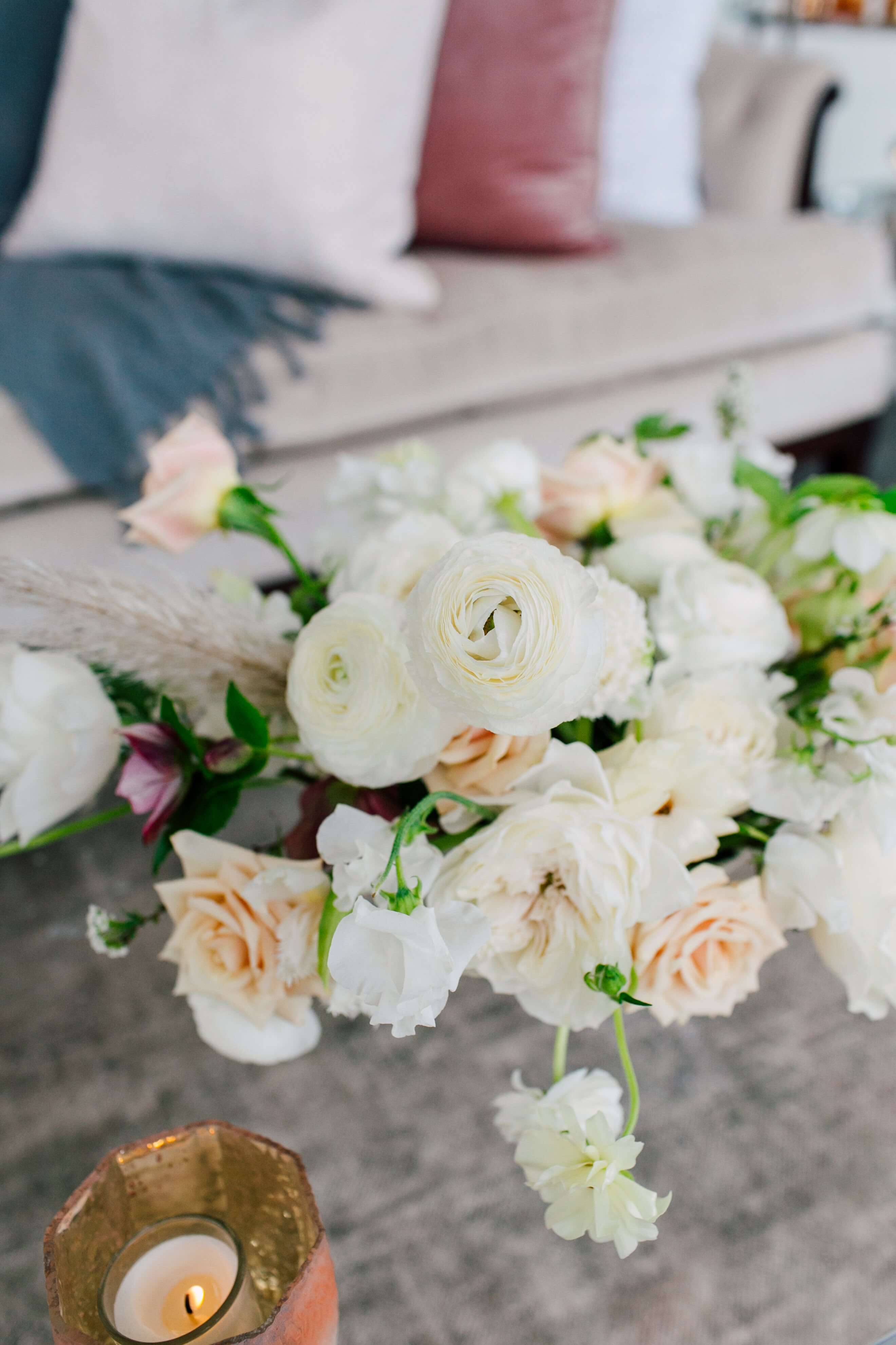 White roses pink and greenery