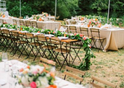 Farm Tables with greenery and spring flowers at lakedale resort