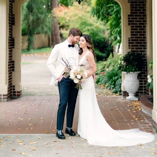 couple standing square